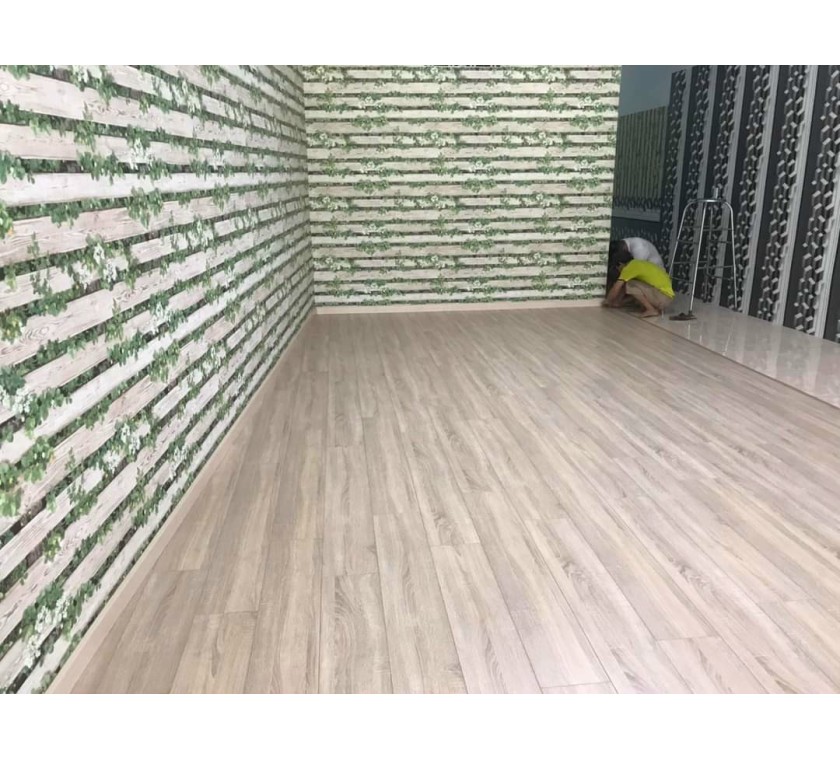 Thi công giấy dán tường mẫu hoa lá cho quán trà sữa a Tuấn, Bà Rịa